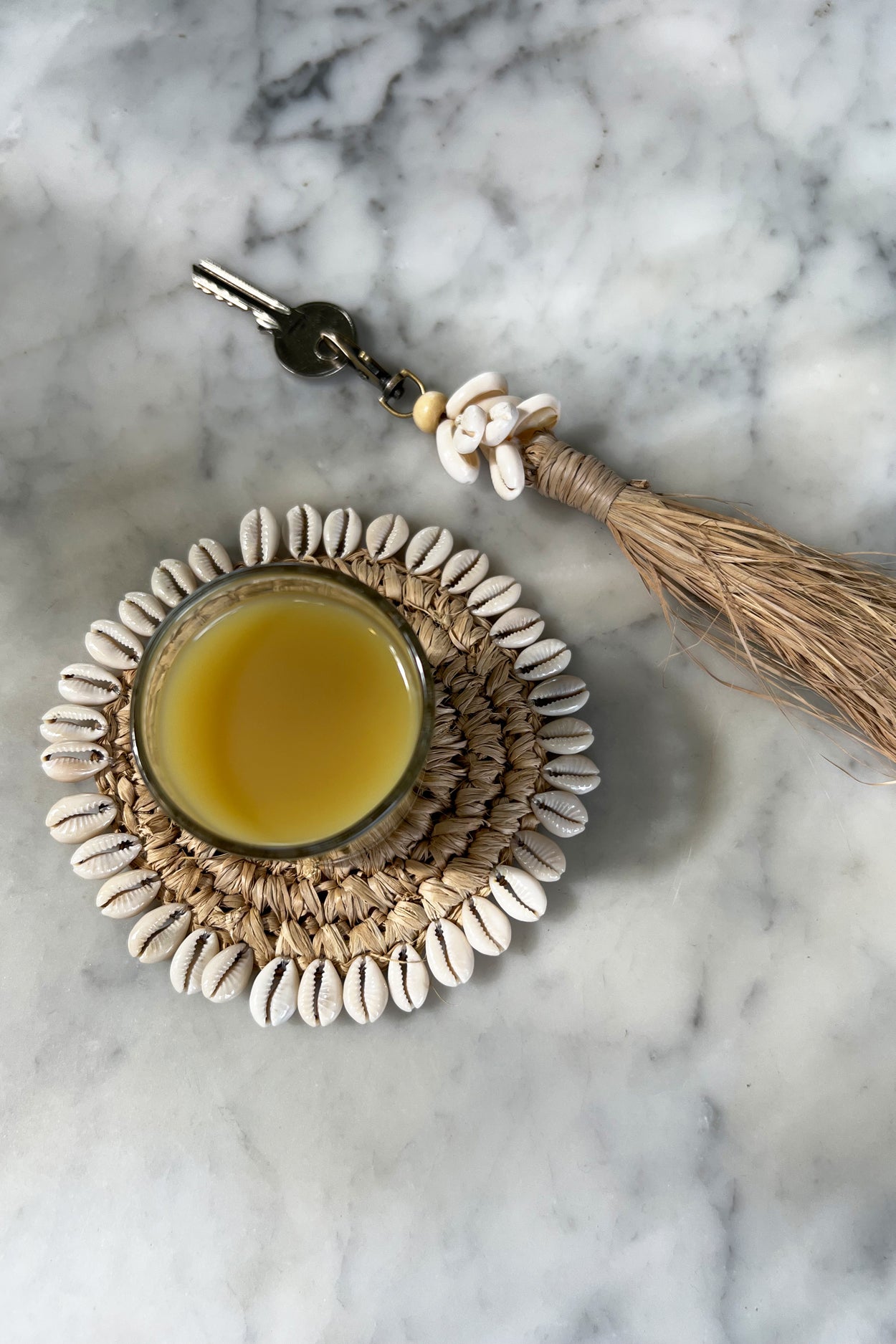 Bazar Bizar De Raffia Cowrie Shell Sleutelhanger